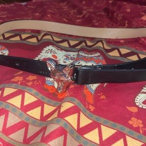 Women's black belt with wolf buckle